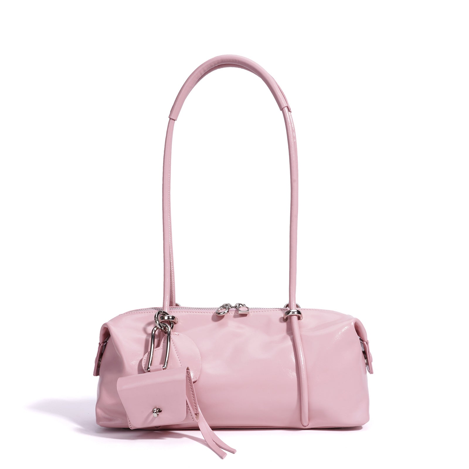 Pink handbag with a strap on a white background