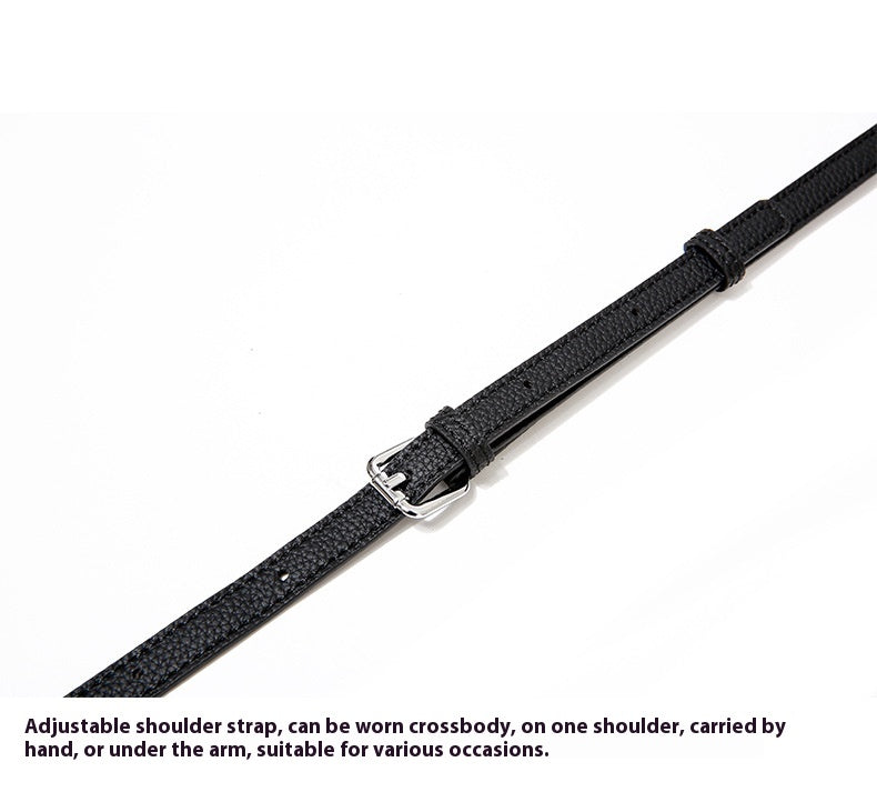 Black adjustable shoulder strap on a white background