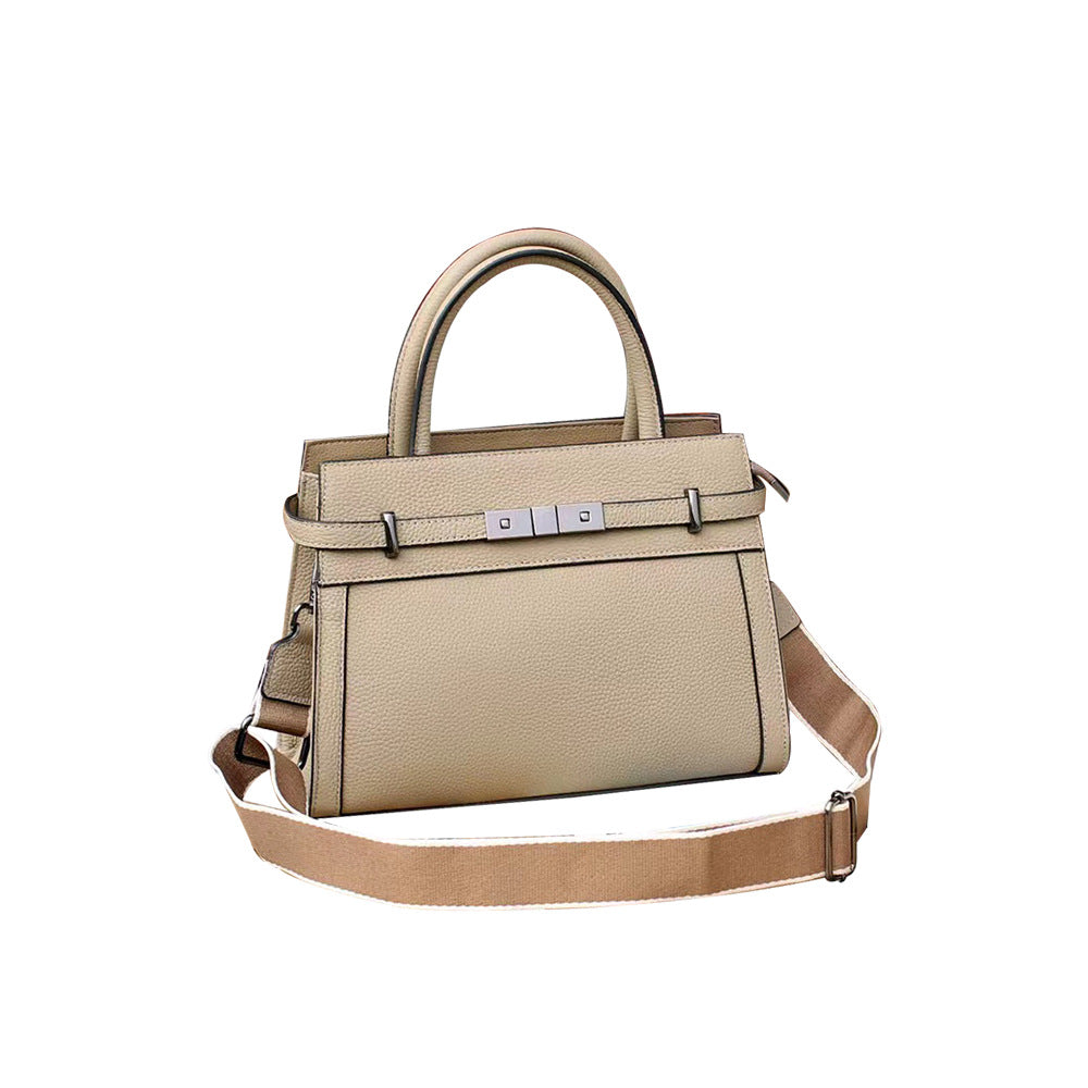 Beige handbag with a strap on a white background