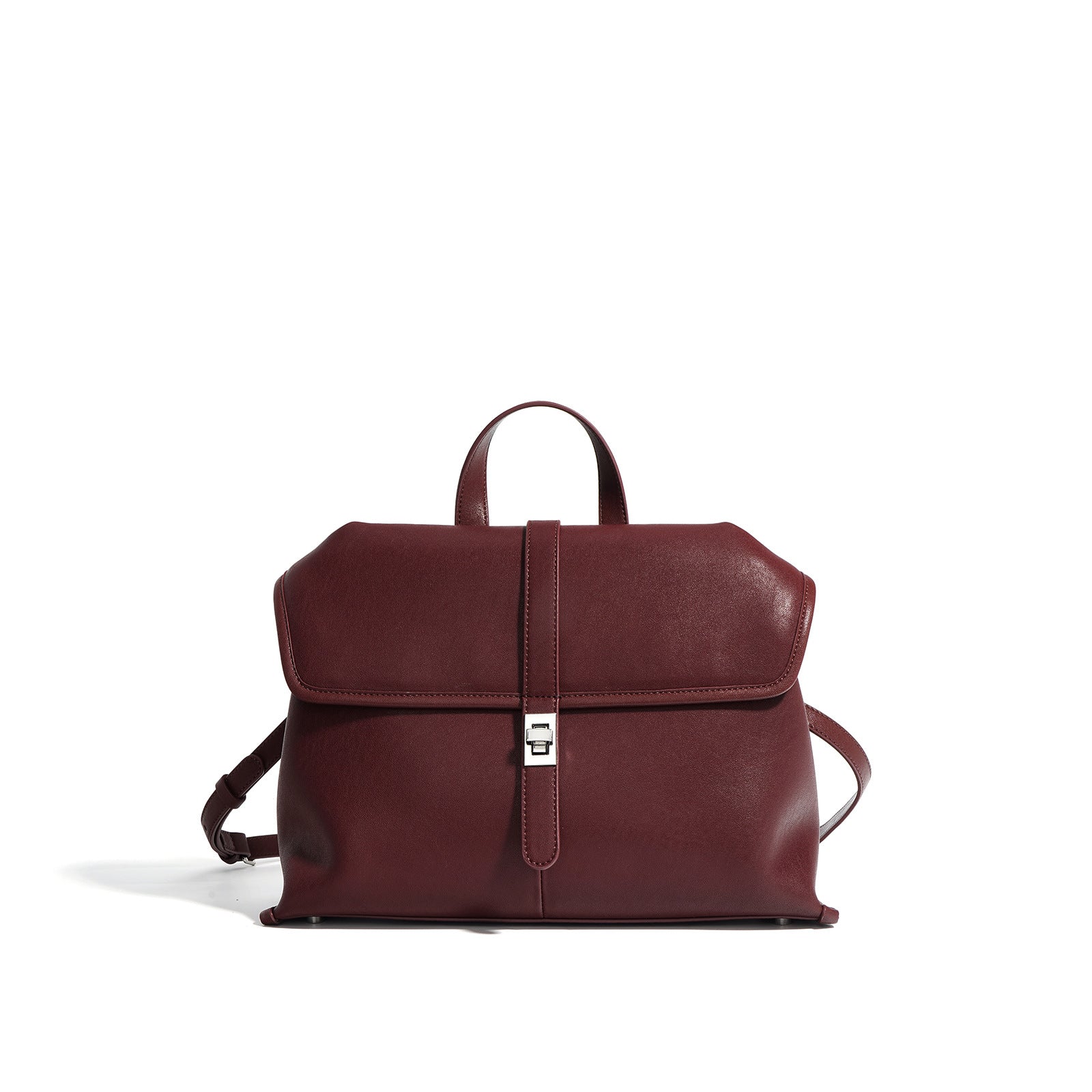 Brown leather backpack on a white background