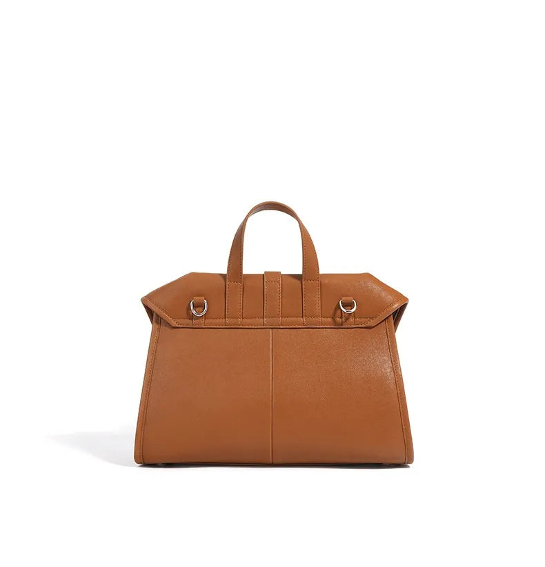 Brown leather handbag on a white background
