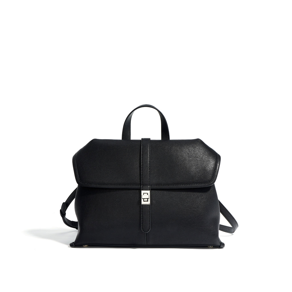 Black backpack on a white background