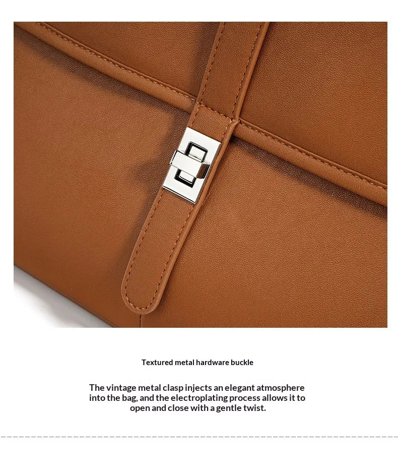 Brown leather bag with textured metal clasp on a white background
