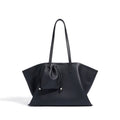 Noir commuter bag worn crossbody street style lifestyle
