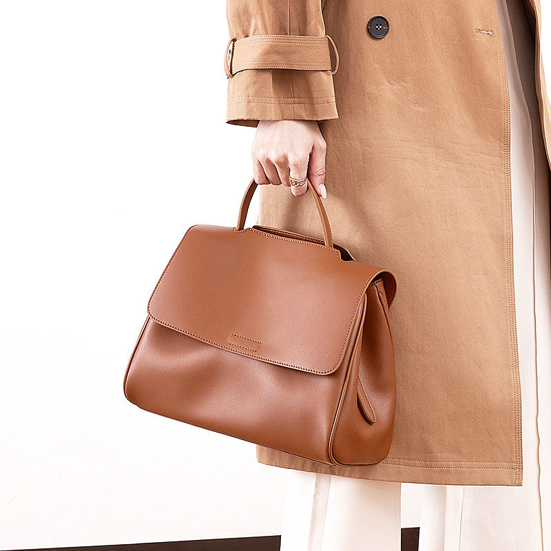 Close-up of premium gold hardware zipper detail on AETHEL vegan leather womens bag