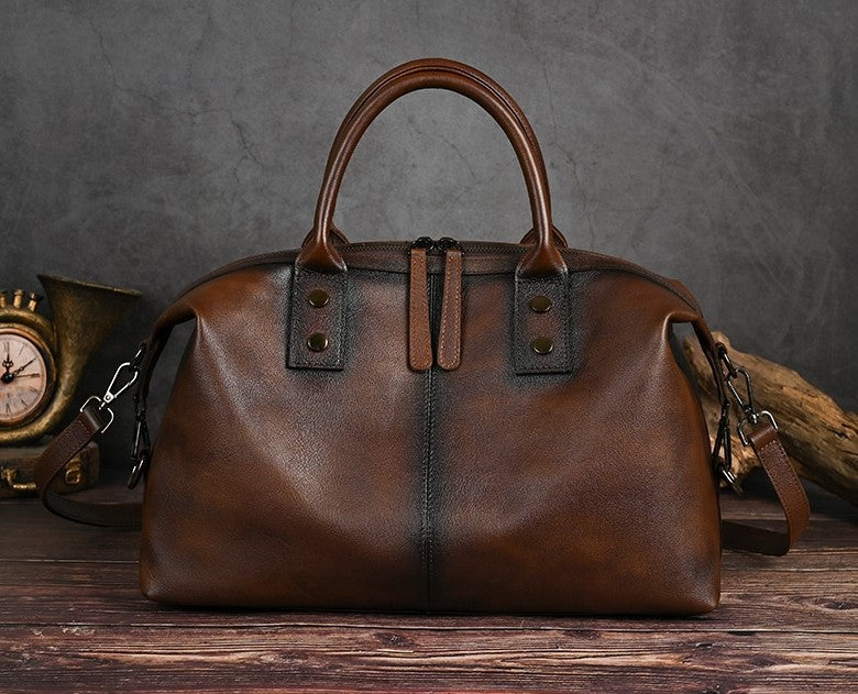 structured women's retro leather tote bag side angle view
