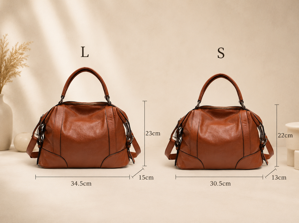 structured women's signature leather shoulder bag side angle view
