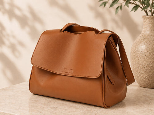 Woman carrying a minimalist vegan leather crossbody bag in Canada by AETHEL